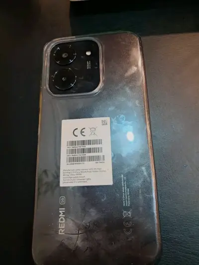 Teléfono Redmi 5G con carcasa - miniatura 1