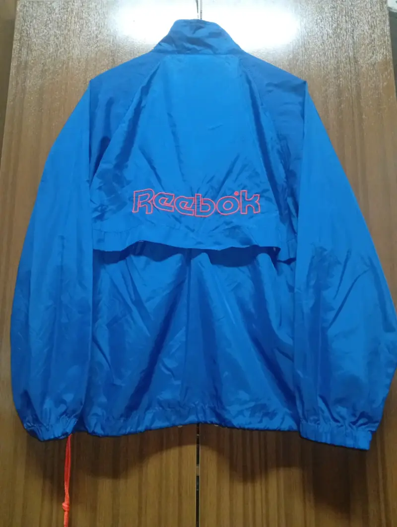 Cortavientos azul Reebok - 4