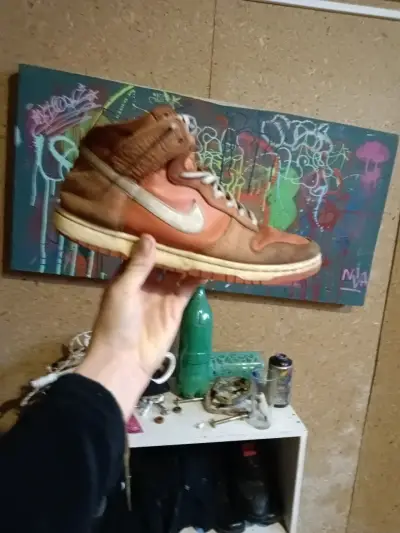 Zapatilla alta naranja usada - miniatura 1