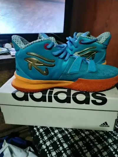 Zapatillas deportivas azules y naranjas - miniatura 2