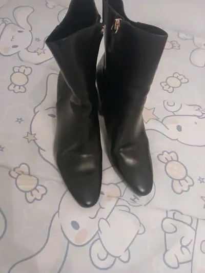 Botas negras de cuero - miniatura 1