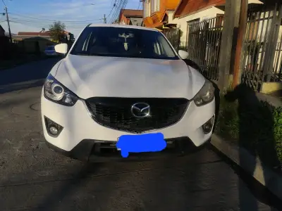 SUV blanca en buen estadoMazda cx5 20132.0 FWDFull - miniatura 1