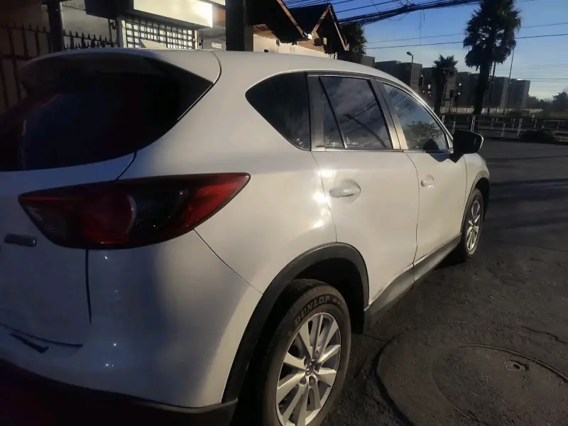 SUV blanca en buen estadoMazda cx5 20132.0 FWDFull - 2