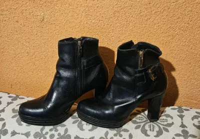 Botines de cuero negro con tacón - miniatura 1
