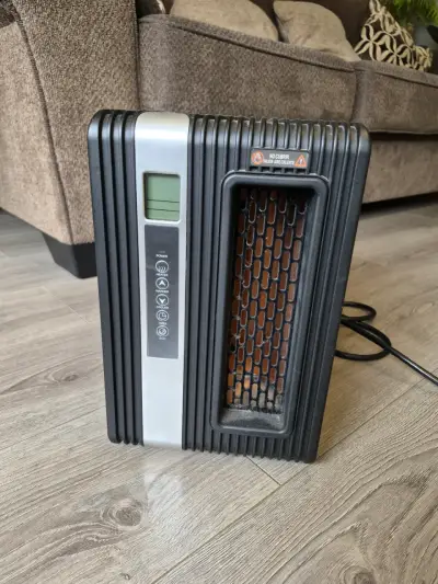 Calefactor eléctrico portátil - miniatura 1
