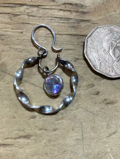 Aro de plata con piedra irisada - miniatura 1
