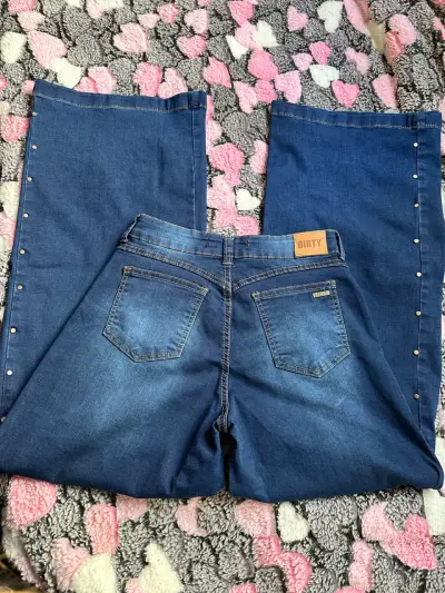 Jeans azul con botones laterales - miniatura 1