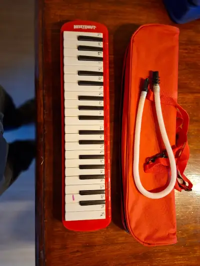 Melódica roja Meisterhaft - miniatura 1