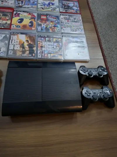 Consola PS3 con juegos y mandos - miniatura 1