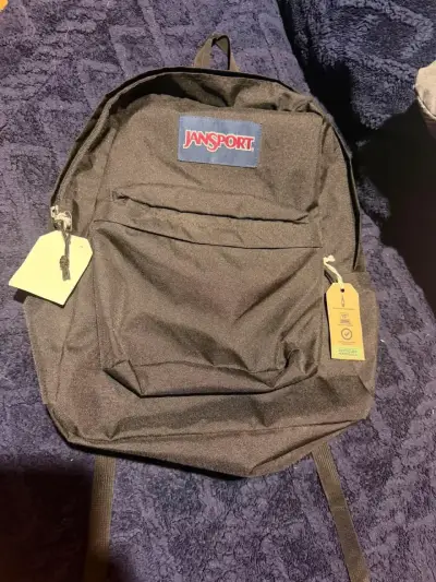 Mochila negra JanSport - miniatura 1