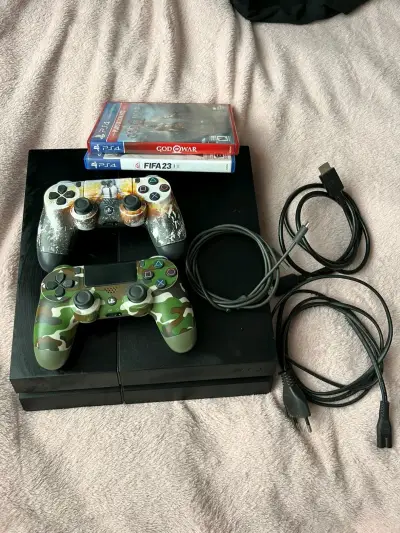 Consola PS4 con control y juegos - miniatura 1