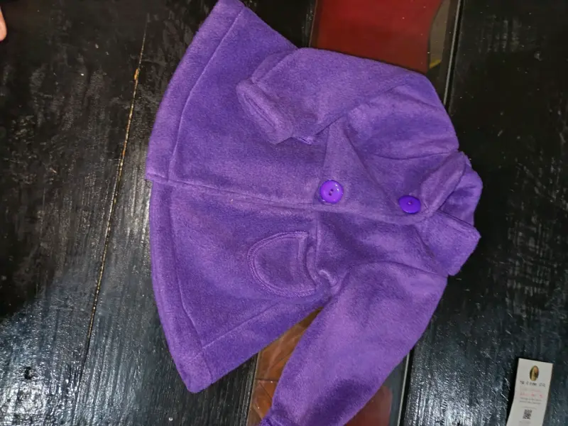 Abrigo infantil morado