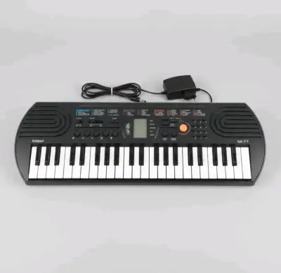 Teclado Casio SA77 incluye transformador - miniatura 2