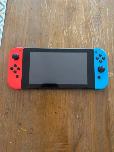 Consola de juegos portátil Nintendo switch - miniatura 1