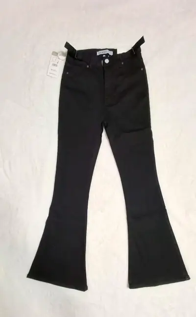 Pantalones acampanados negros - miniatura 1