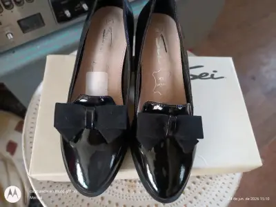 Zapatos negros con lazo - miniatura 1