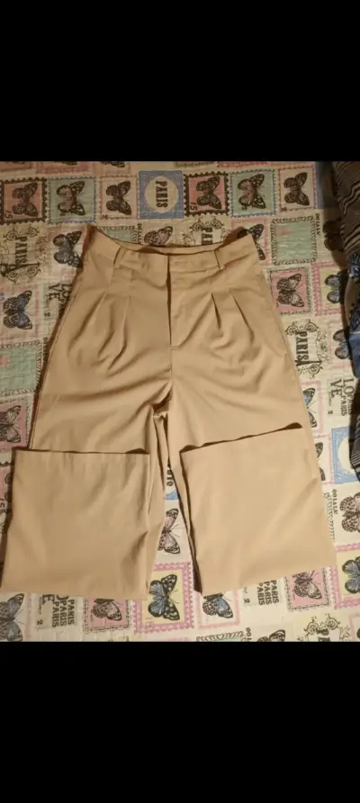Pantalones beige elegantes - miniatura 1