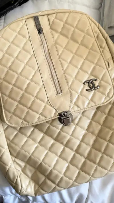 Mochila beige acolchada - miniatura 1
