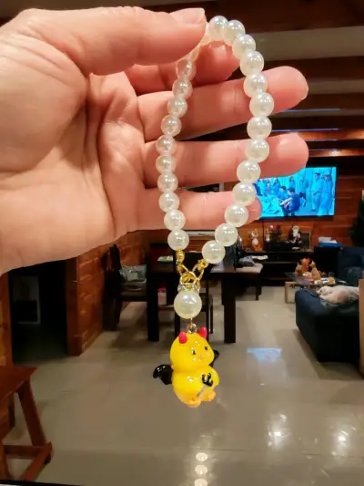 Pulsera perlas con colgante amarillo - miniatura 1