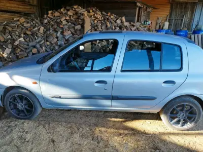 Auto Renault Clio 2 compacto  gris en buen estado - miniatura 1