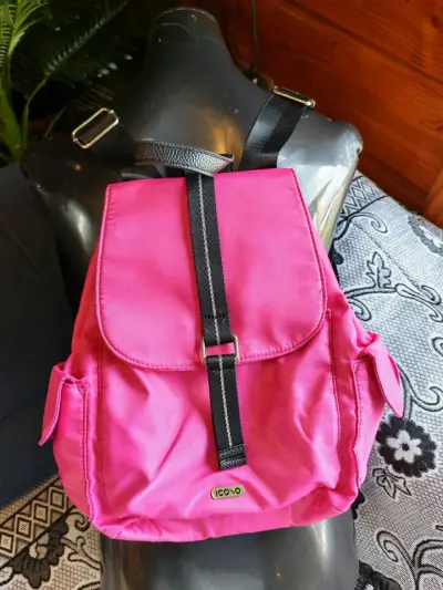Mochila rosada Icoo con bolsillos - miniatura 1