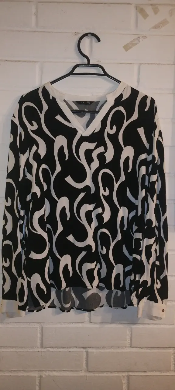 Blusa estampada blanco y negro
