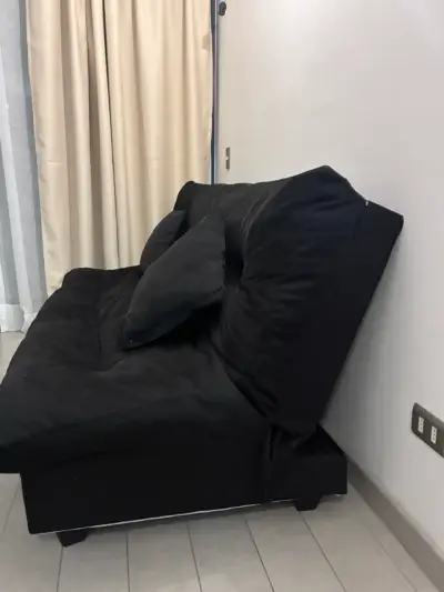 Sofá cama negro con cojines y 2 Puga - miniatura 2