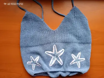 Top tejido azul con estrellas - miniatura 1