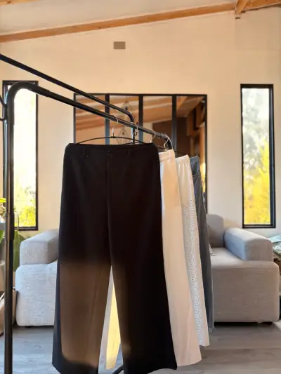 Pantalones negros elegantes y blancos - miniatura 1