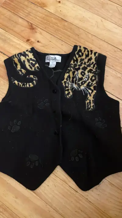 Chaleco negro con estampado de leopardo - miniatura 1