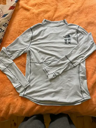 Polera térmica gris The North Face - miniatura 1