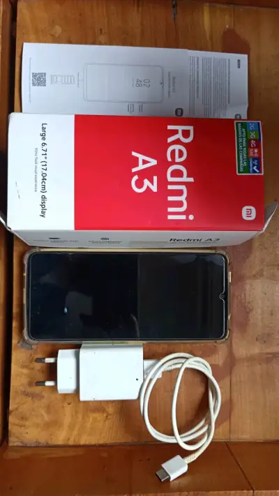 Smartphone Xiaomi Redmi A3 con cargador - miniatura 2