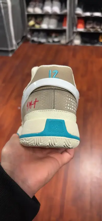 Zapatillas deportivas Nike beige y celeste - miniatura 3