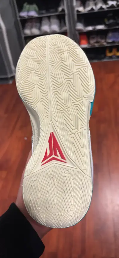 Zapatillas deportivas Nike beige y celeste - miniatura 4