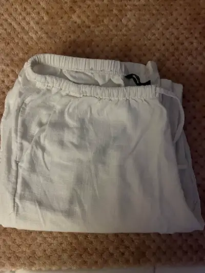 Pantalones blancos de lino para mujer - miniatura 2