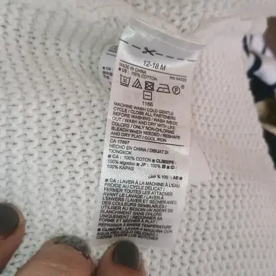 Chaleco blanco de bebé tejido - miniatura 3