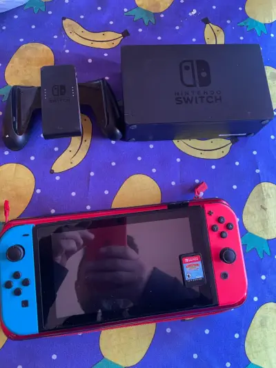 Consola Nintendo Switch con accesorios - miniatura 1