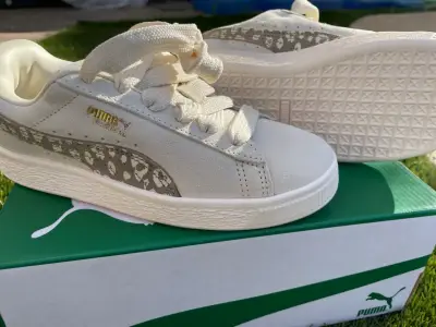 Zapatillas Puma blancas con diseño - miniatura 1