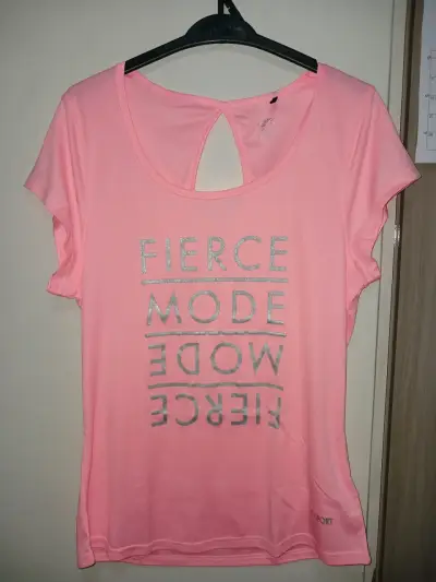 Polera deportiva rosa, talla L. - miniatura 1