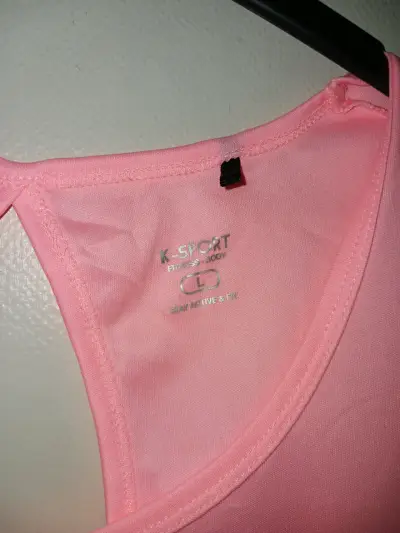 Polera deportiva rosa, talla L. - miniatura 2