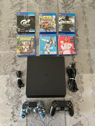 Consola PS4 slim 1TB  con 6 juegos y 2 controles - miniatura 1
