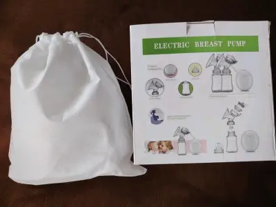 Extractor de leche eléctrico con accesorios - miniatura 1
