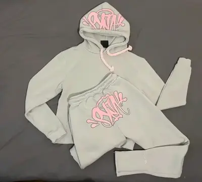 Conjunto buzo syna world - miniatura 1