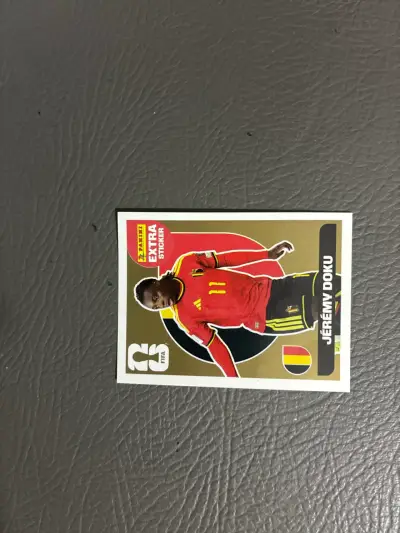 Extra sticker oro de  Jérémy Doku - miniatura 1