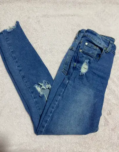 Jeans desgastados azul para mujer - miniatura 1