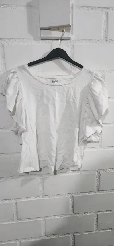 Blusa blanca con mangas abullonadas - miniatura 1