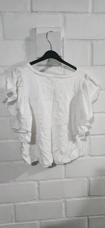 Blusa blanca con mangas abullonadas - miniatura 2