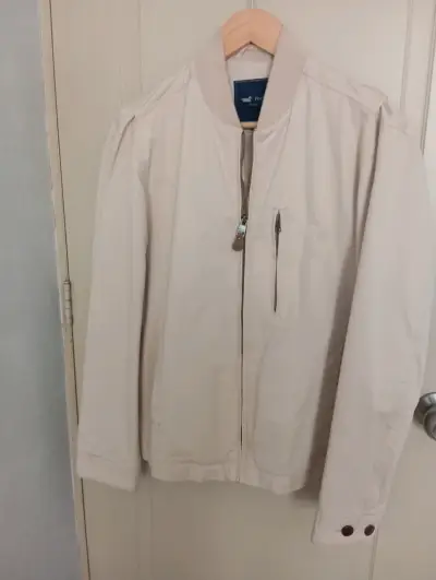 Chaqueta beige con cierre y bolsillos - miniatura 1