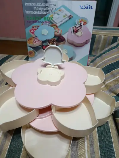 Caja de dulces giratoria en forma de flor - miniatura 1