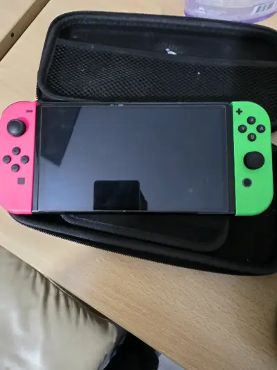 Nintendo switch oled - miniatura 1